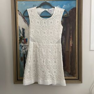 White dress size small. Good used condition.